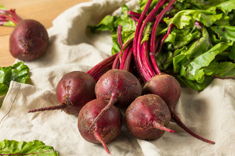 Fresh beets with stems and leaves