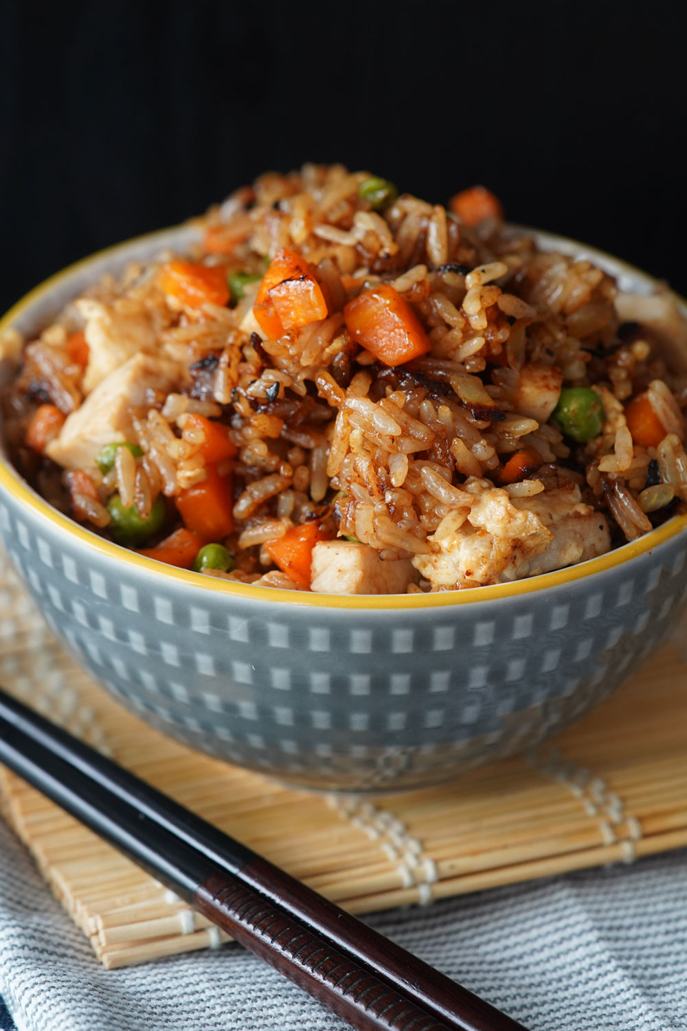 A bowl of chicken fried rice