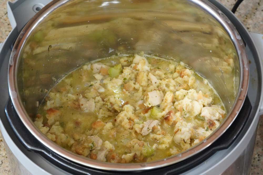 Uncooked chicken stuffing casserole in the Instant Pot