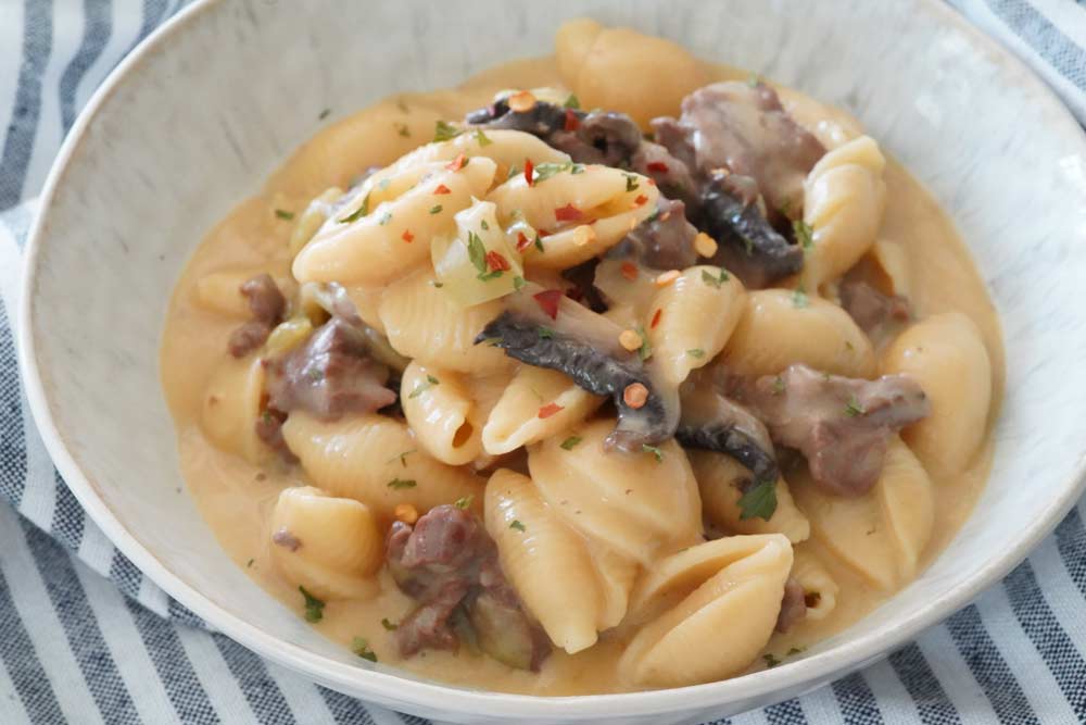 A bowl of Philly cheesesteak pasta