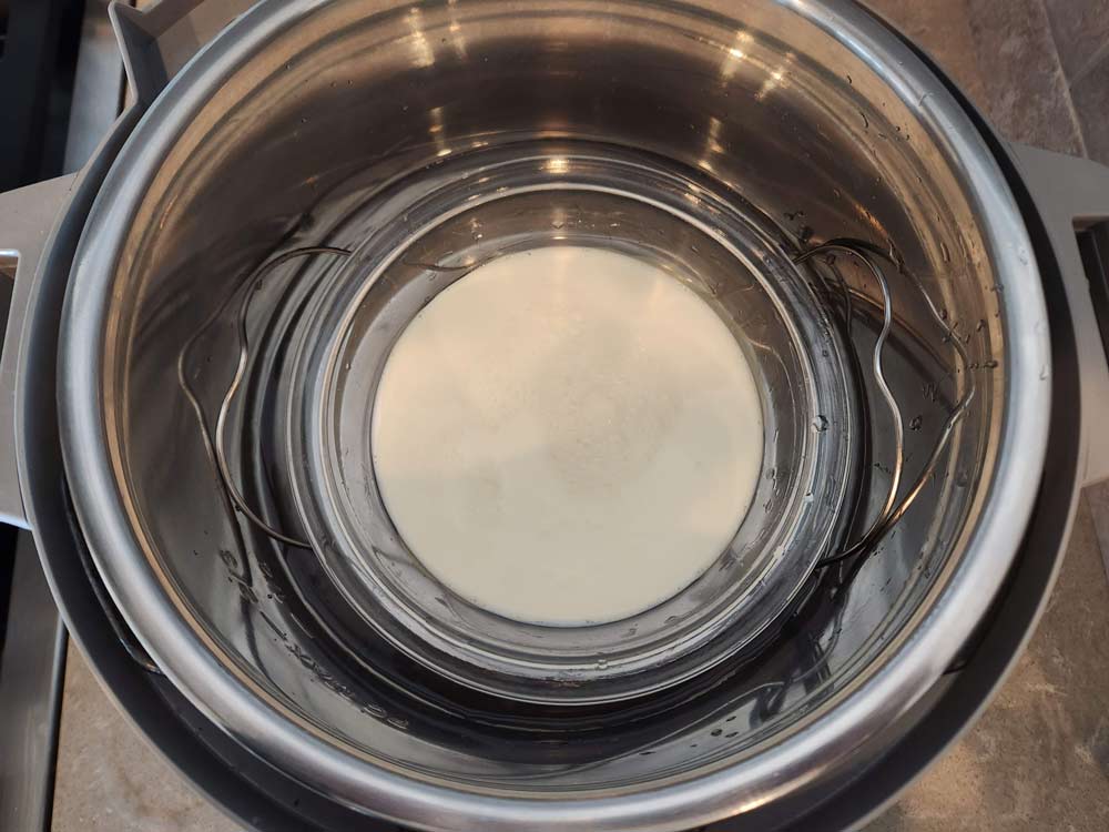 eggnog in a bowl on the trivet in the Instant Pot