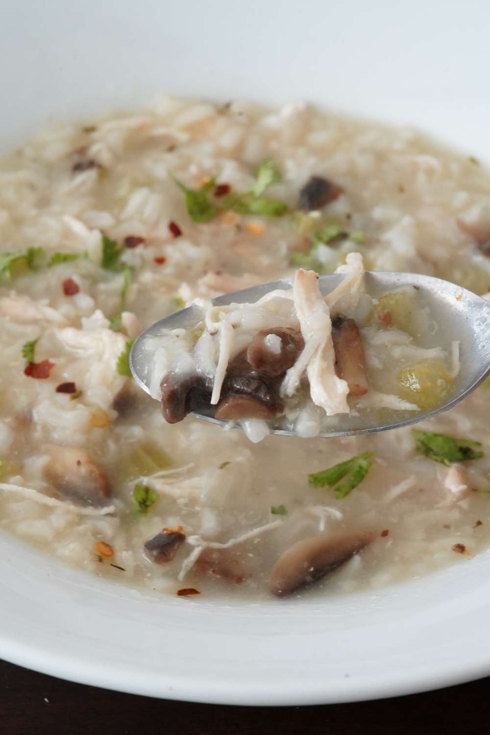 A bowl of chicken and rice soup