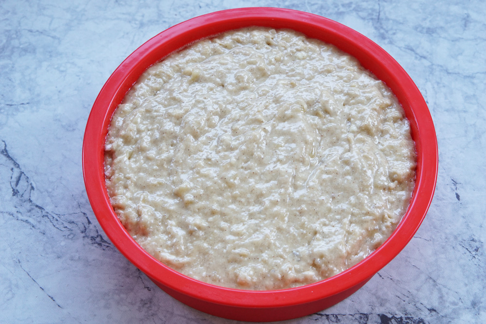 banana bread batter in the cake pan