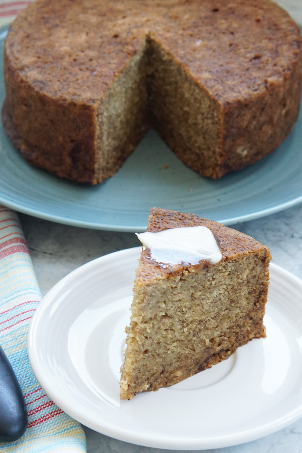 Instant Pot banana bread with a slice cut out.