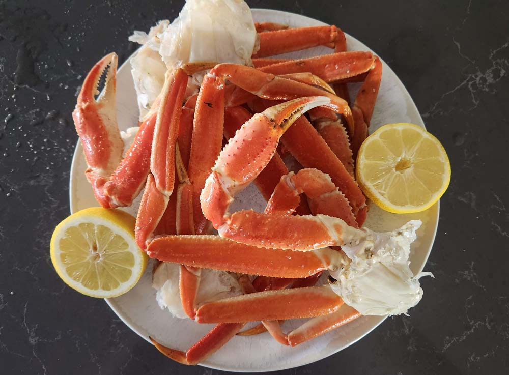 A plate of steamed snow crab legs