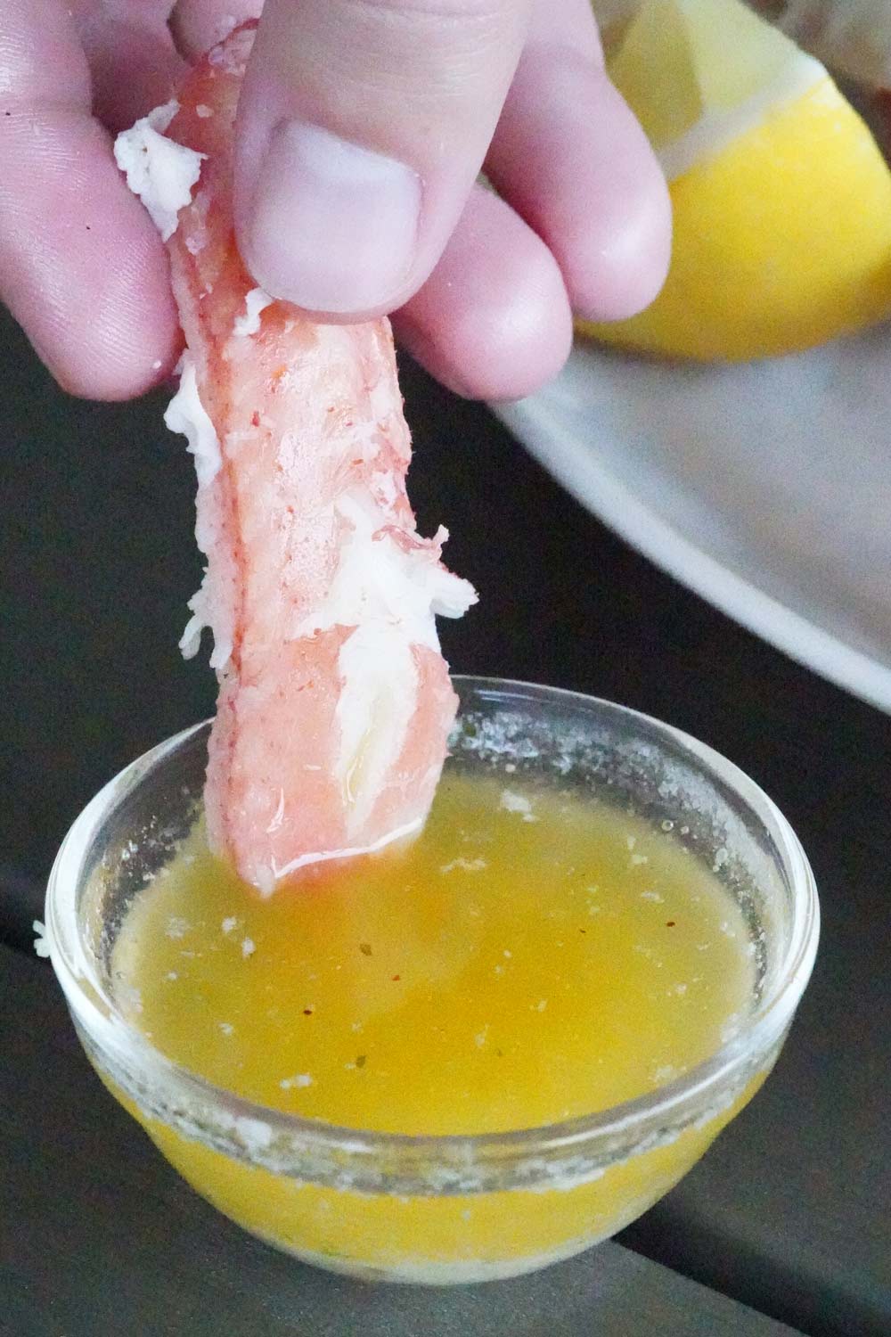 Dipping snow crab into butter