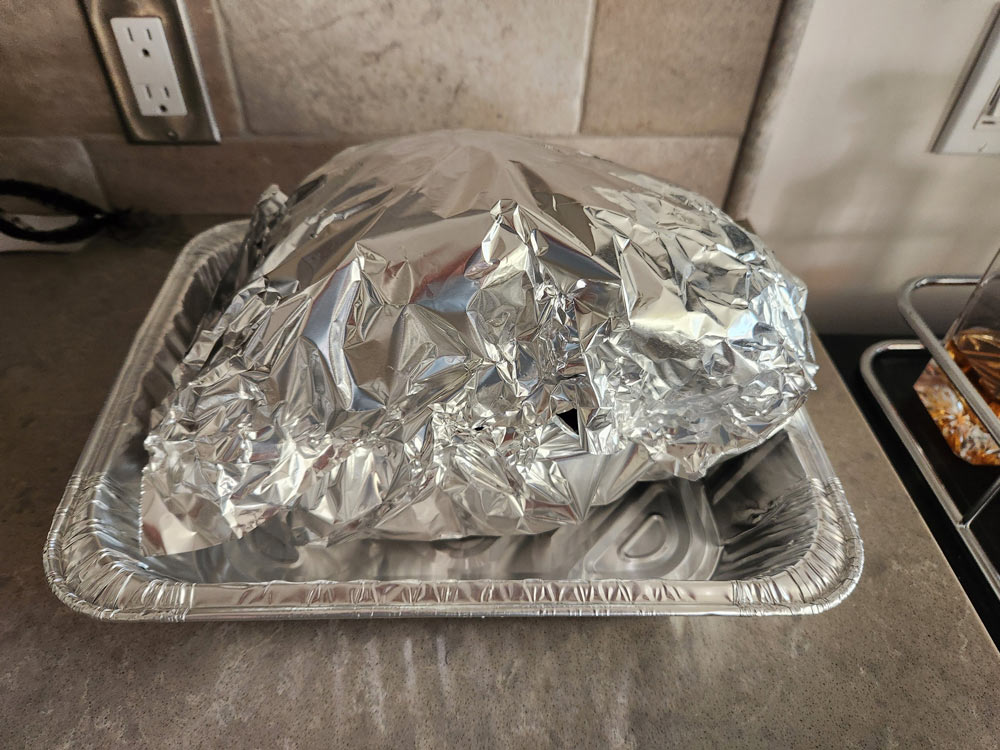 A ham wrapped in tinfoil