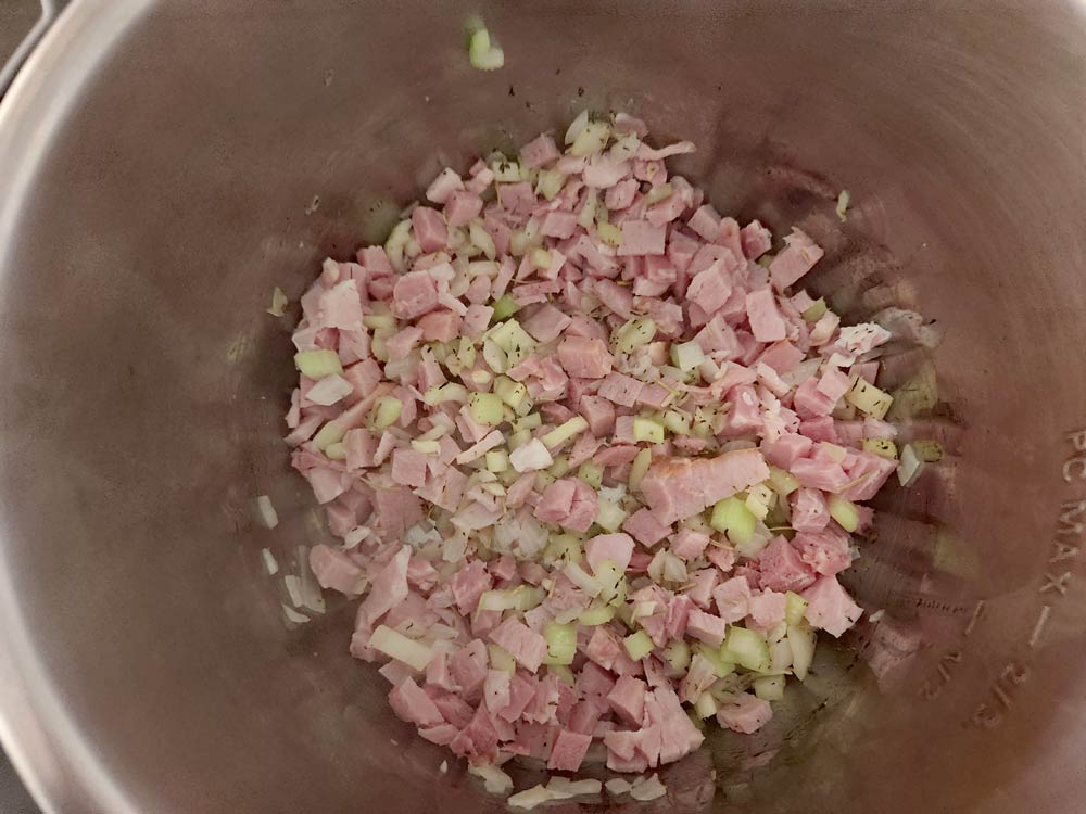 Adding the ham and potatoes