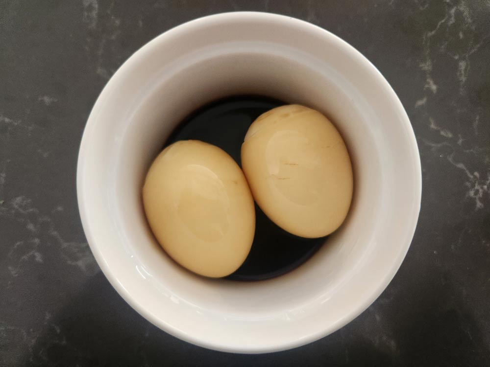 soft boiled eggs in soy sauce