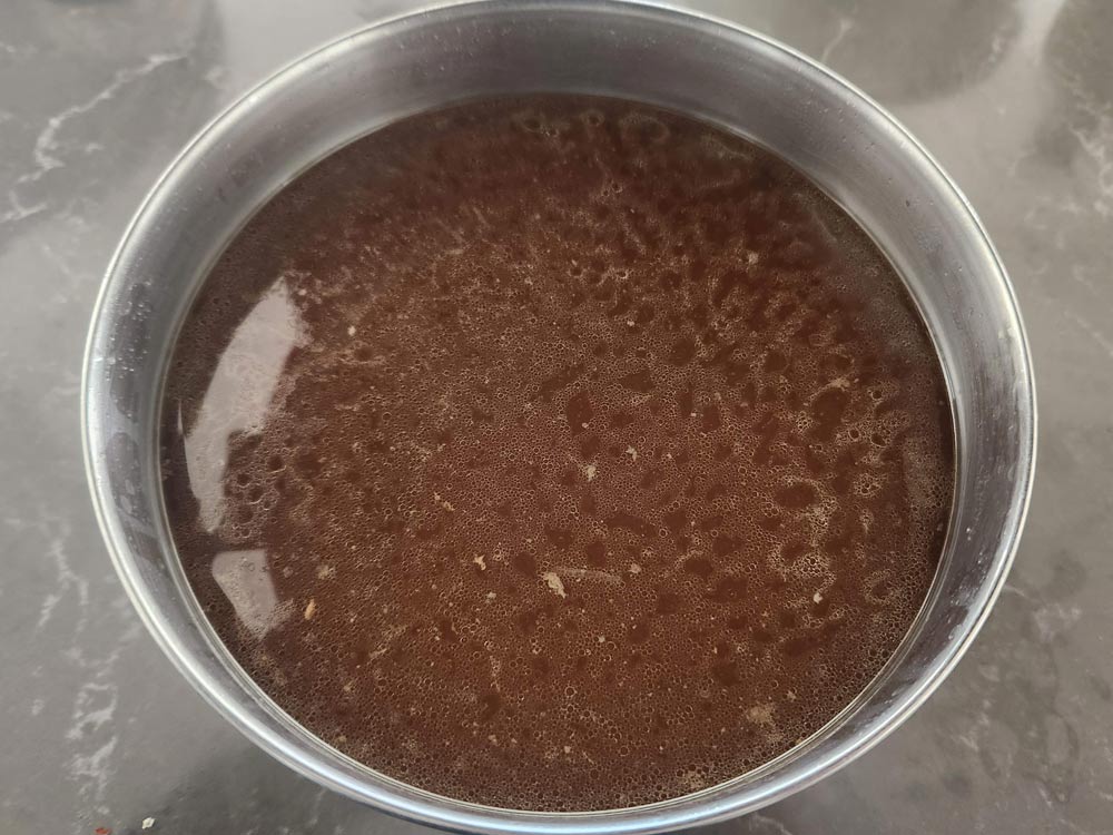cooked broth after it has been strained.